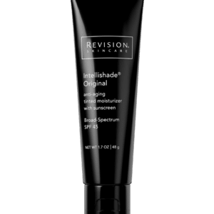 The image shows a black tube of Revision Skincare Intellishade Original anti-aging tinted moisturizer with SPF 45 sunscreen on a green background.