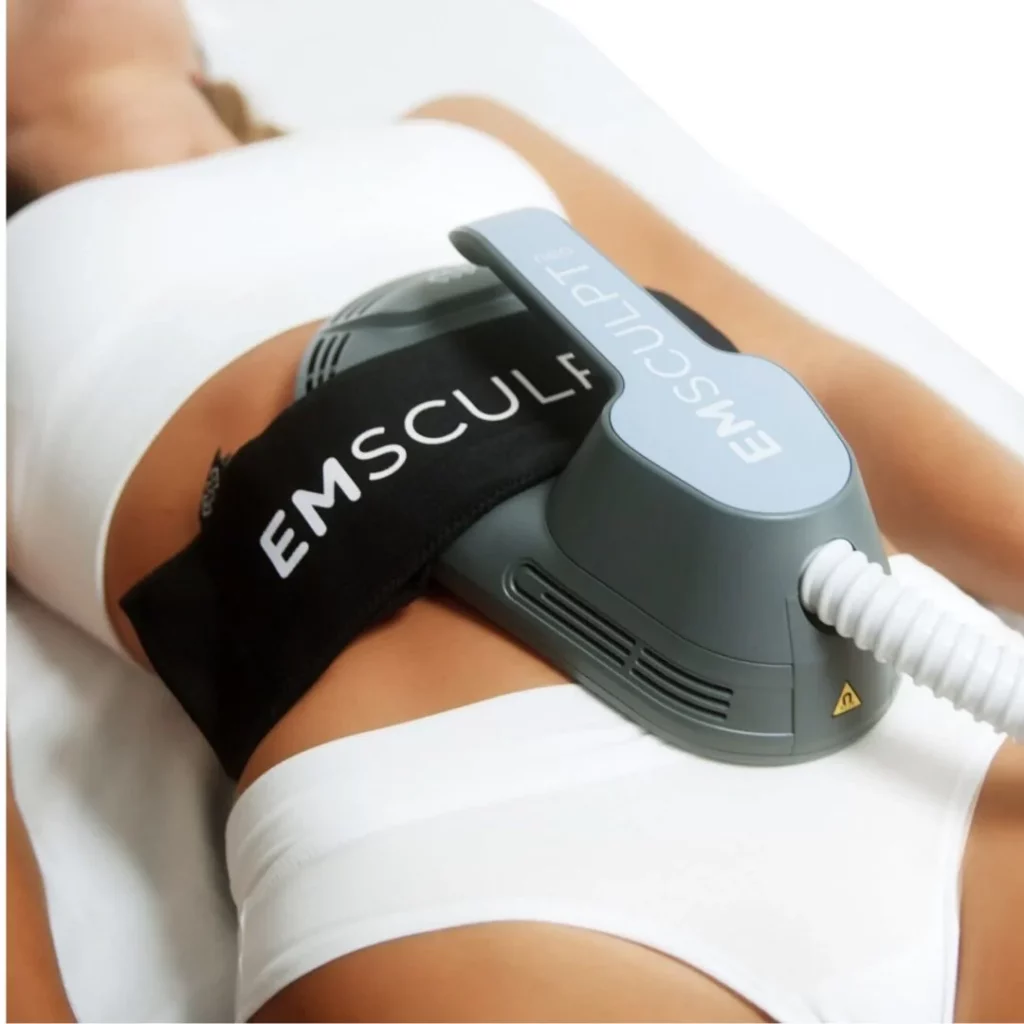The image shows a person lying down with a device labeled "EMSCULPT" strapped around their midsection, presumably for muscle toning or body contouring.