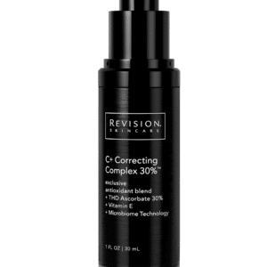 The image shows a sleek, black skincare product bottle labeled "Revision Skincare C+ Correcting Complex 30%" with pump dispenser and text highlighting its active ingredients.