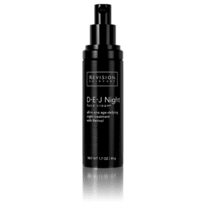 This image shows a black pump bottle labeled "Revision Skincare D·E·J Night face cream" which is an all-in-one age-defying night treatment with Retinol.