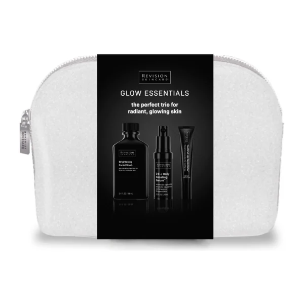 A skincare set titled "Glow Essentials" by Revision Skincare, featuring three product bottles and a white pouch with a zipper.